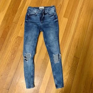 Free People Skinny Jeans with ripped knees